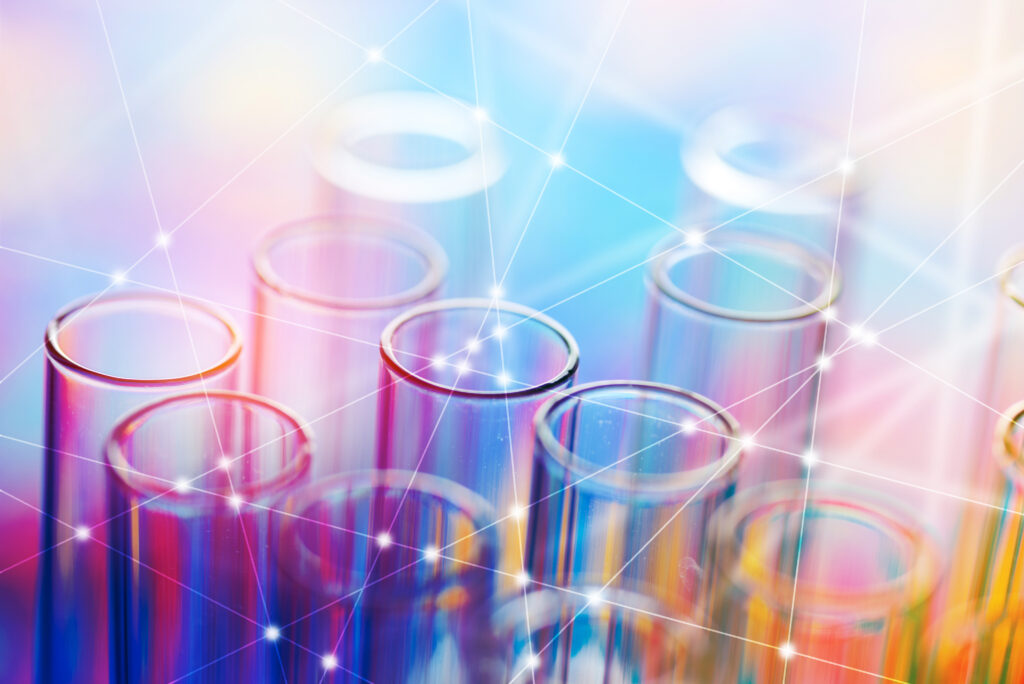 colorful rows of laboratory test tubes , science background representing clinical trials.